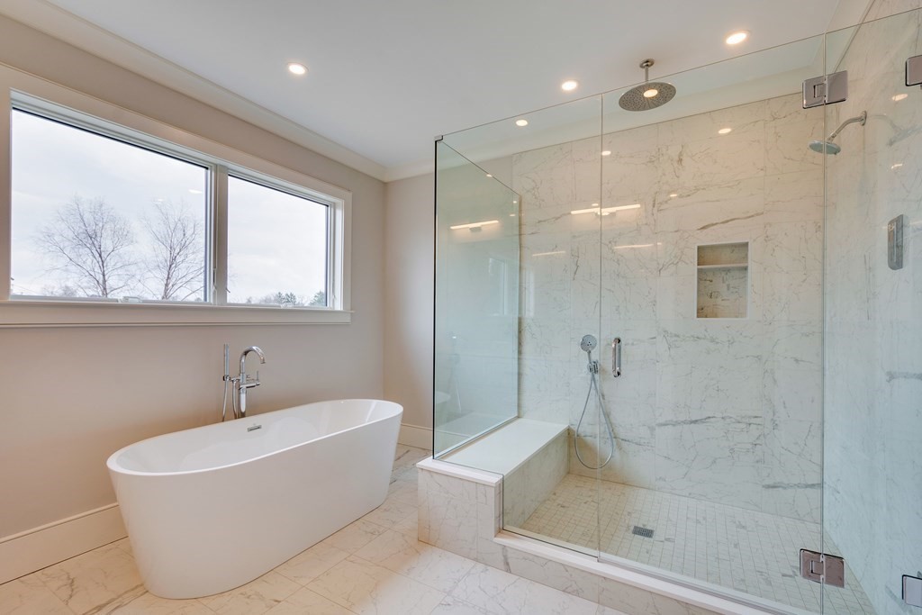 192 Evelyn Road Newton, MA 02468 - Photo 29 of 41 a bathroom with a bathtub and shower