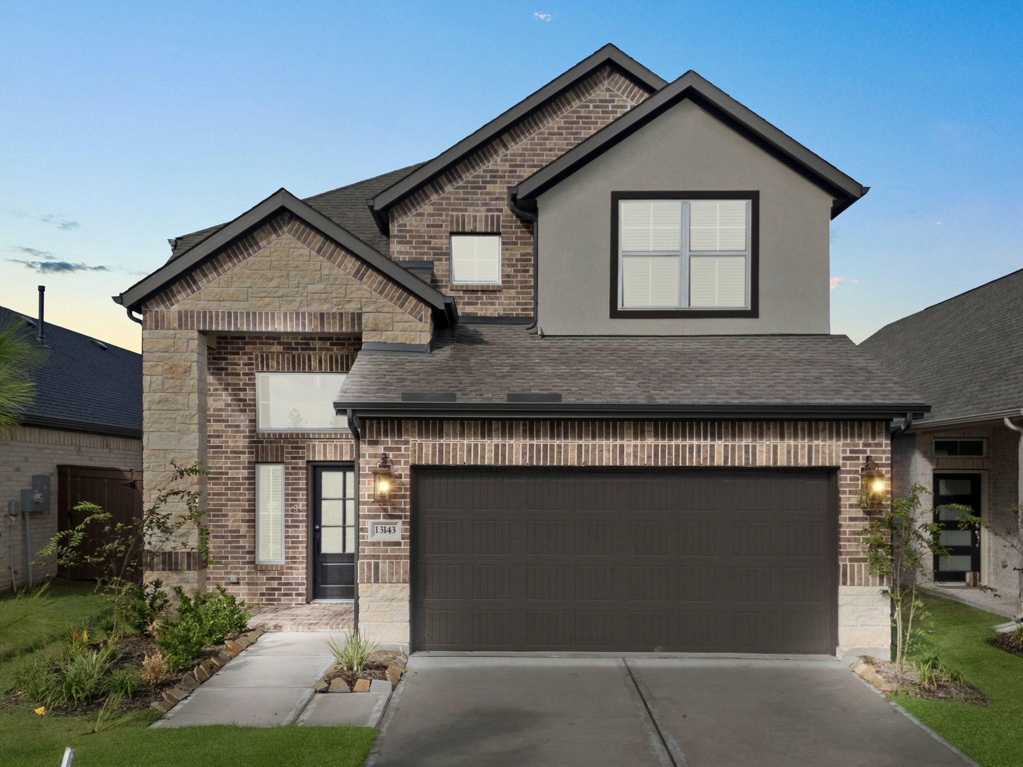 329 Rock Rose Path Willis, TX 77318 - Photo 1 of 36 a front view of a house with garage