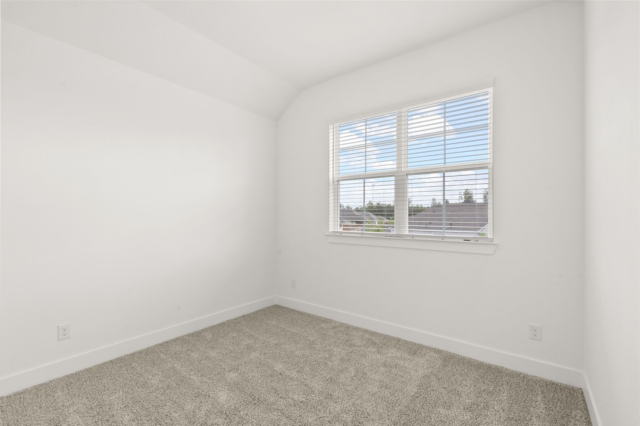 329 Rock Rose Path Willis, TX 77318 - Photo 20 of 36 an empty room with a window