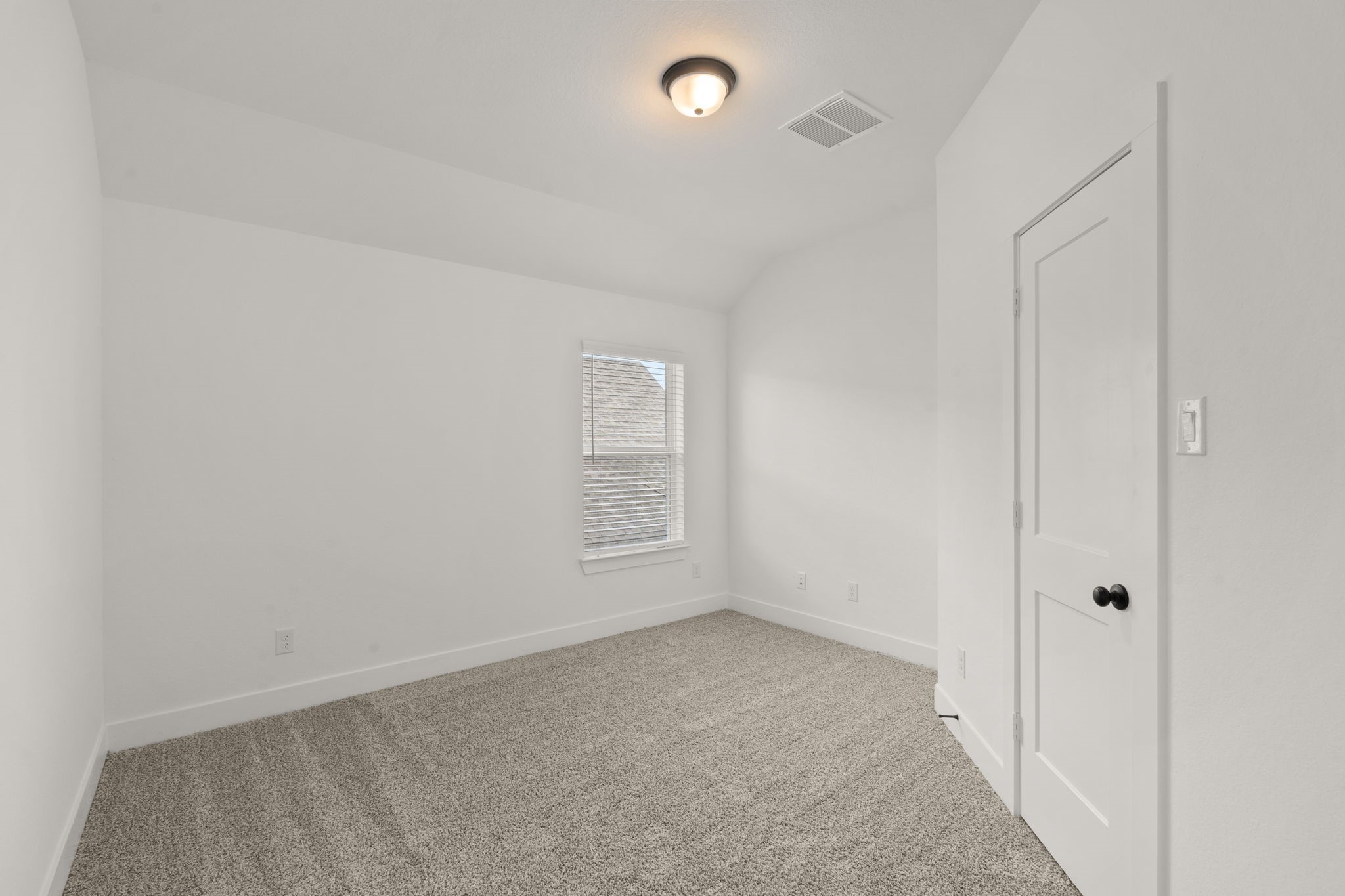 329 Rock Rose Path Willis, TX 77318 - Photo 24 of 36 an empty room with a empty space and windows