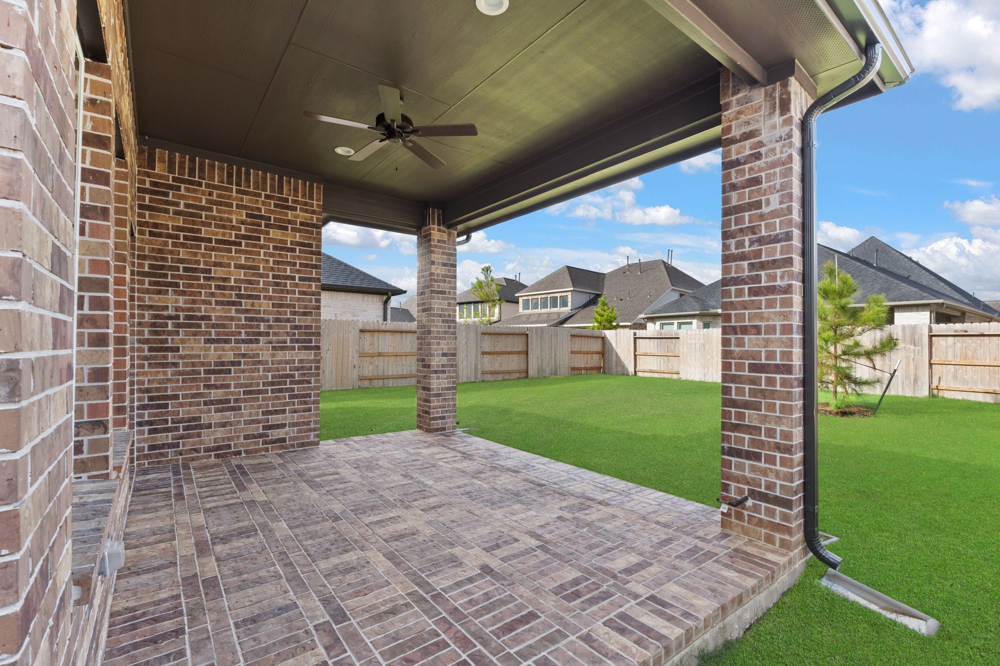 329 Rock Rose Path Willis, TX 77318 - Photo 27 of 36 a view of a porch with a yard