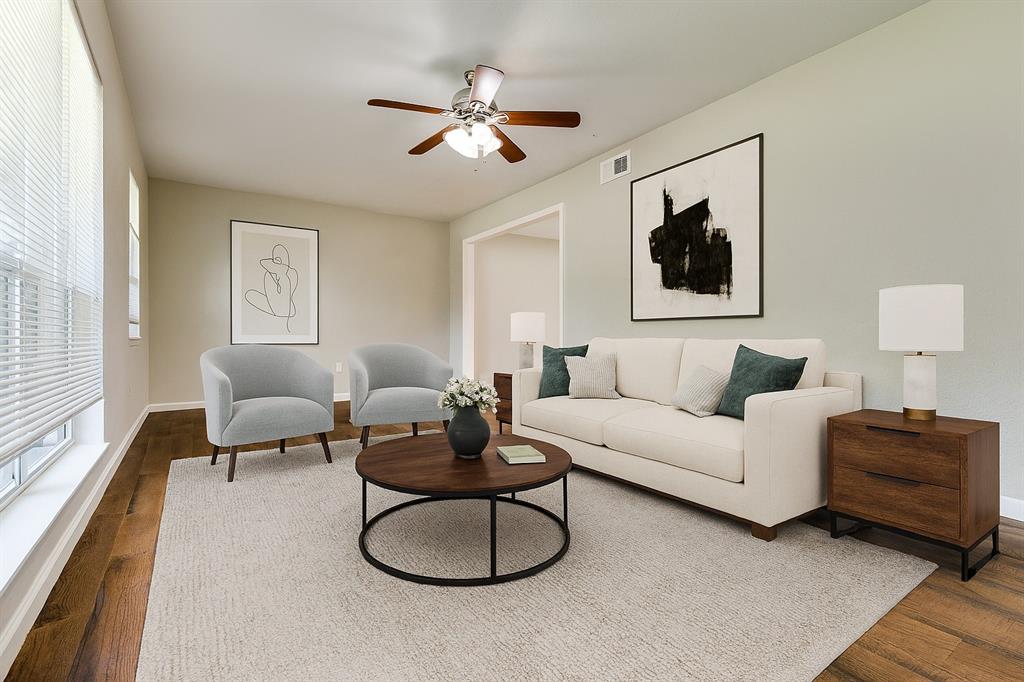 1202 Quill Drive Plano, TX 75075 - Photo 3 of 28 a living room with furniture a large window and a lamp