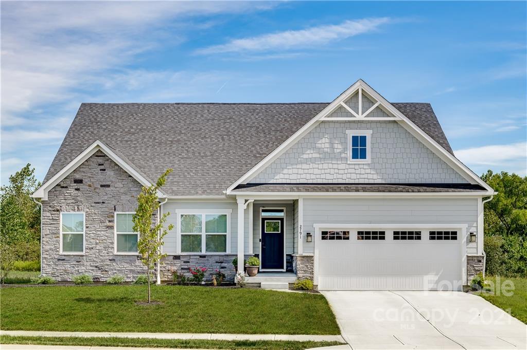 3078 Ballester Road, Unit 258 Indian Land, SC 29707 - Photo 1 of 12 a front view of a house with a yard