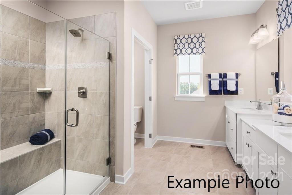 3078 Ballester Road, Unit 258 Indian Land, SC 29707 - Photo 12 of 12 a bathroom with a shower and a sink