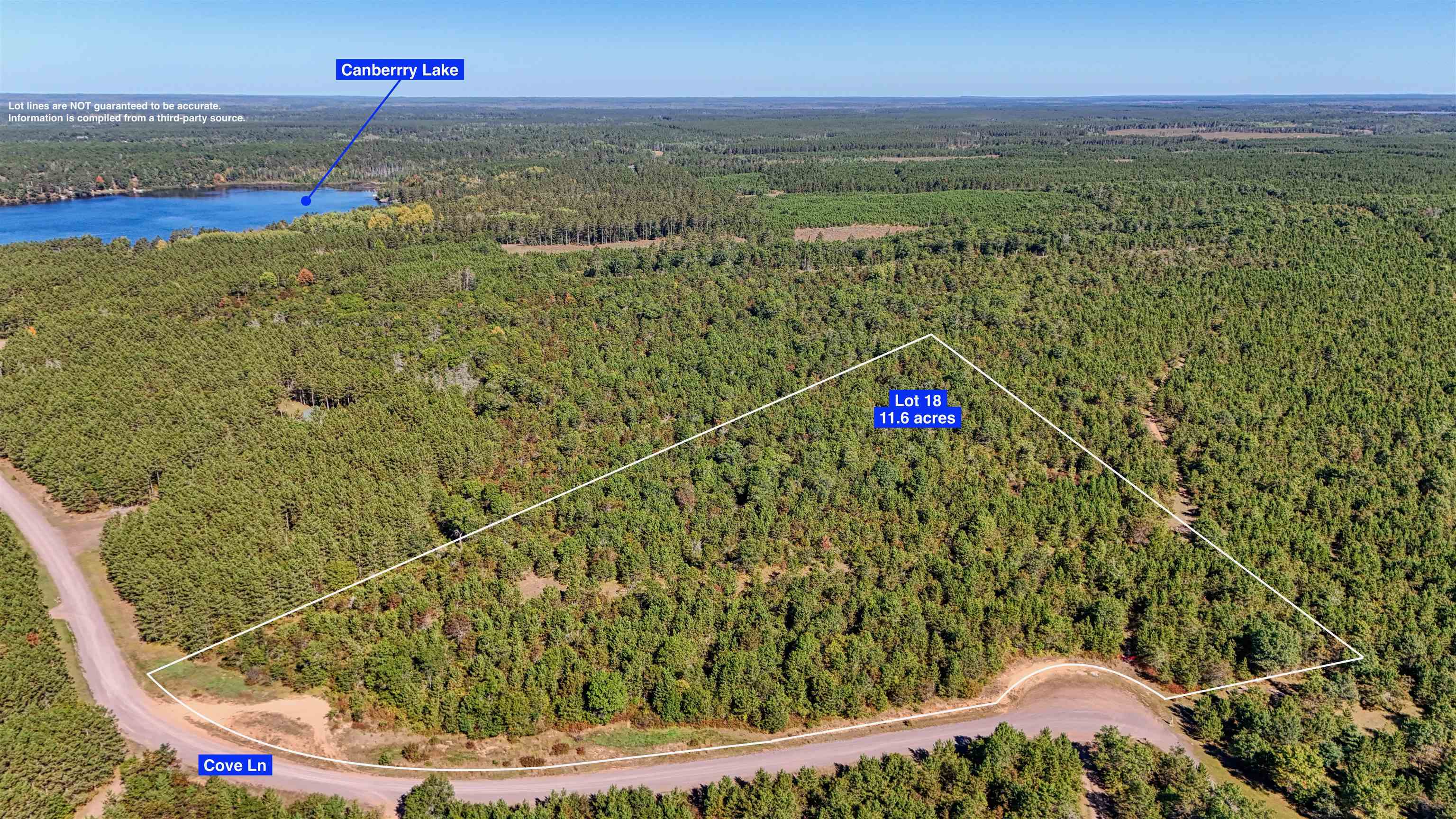 Aerial view of property's location featuring property boundaries highlighted and a large body of water