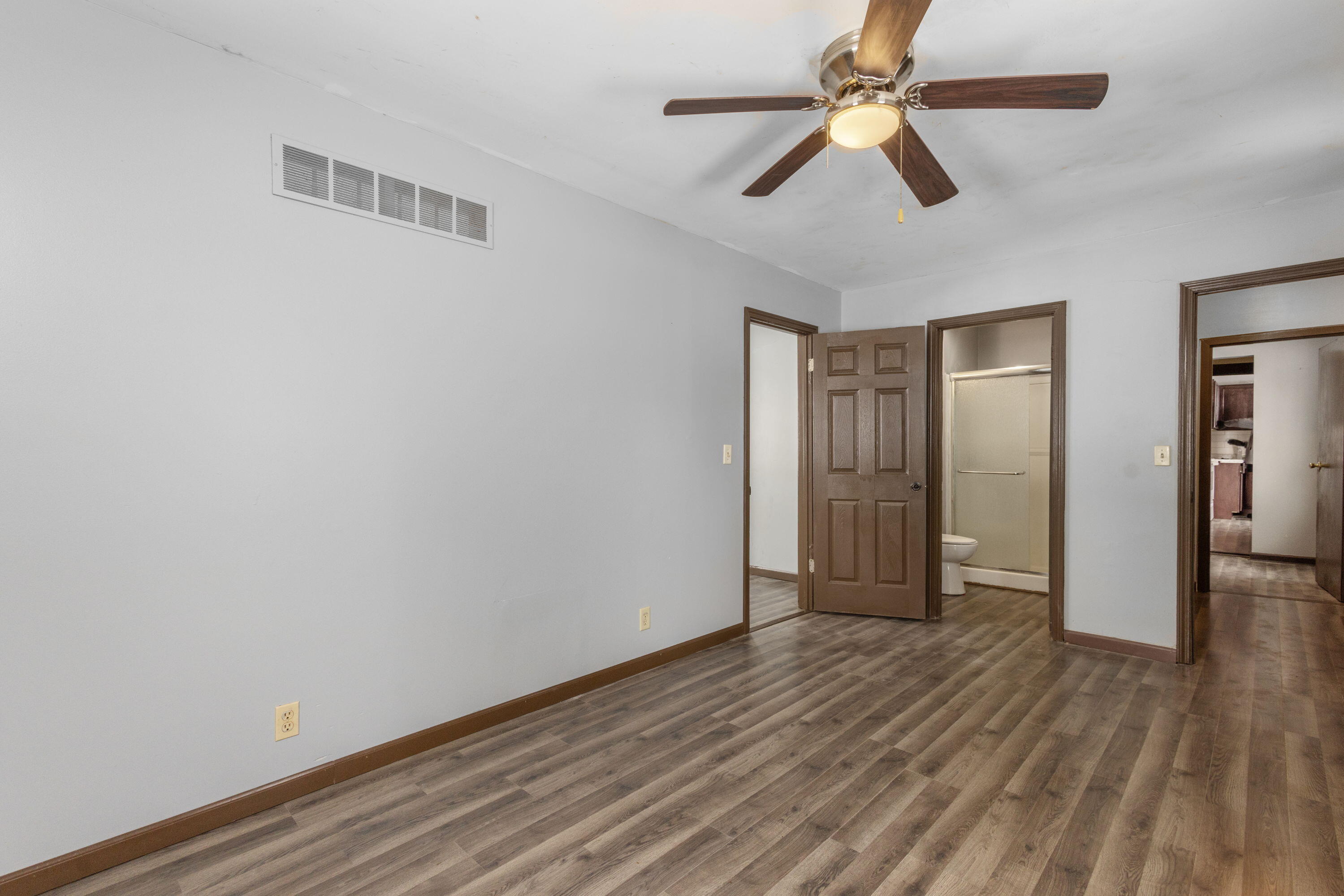 203 North Main Street Kingsbury, IN 46350 - Photo 12 of 32 wooden floor in an empty room