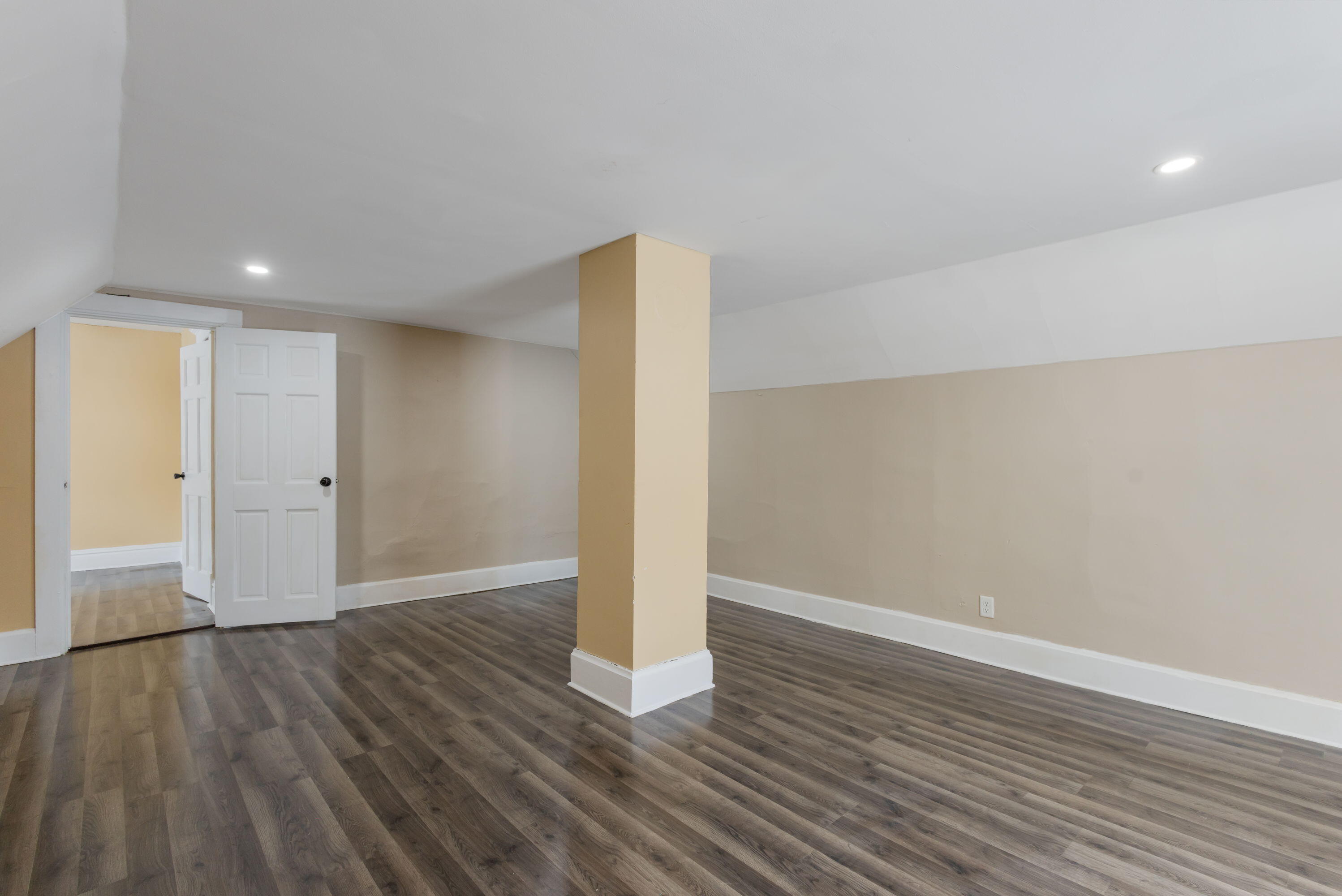 203 North Main Street Kingsbury, IN 46350 - Photo 18 of 32 a view of an empty room with wooden floor