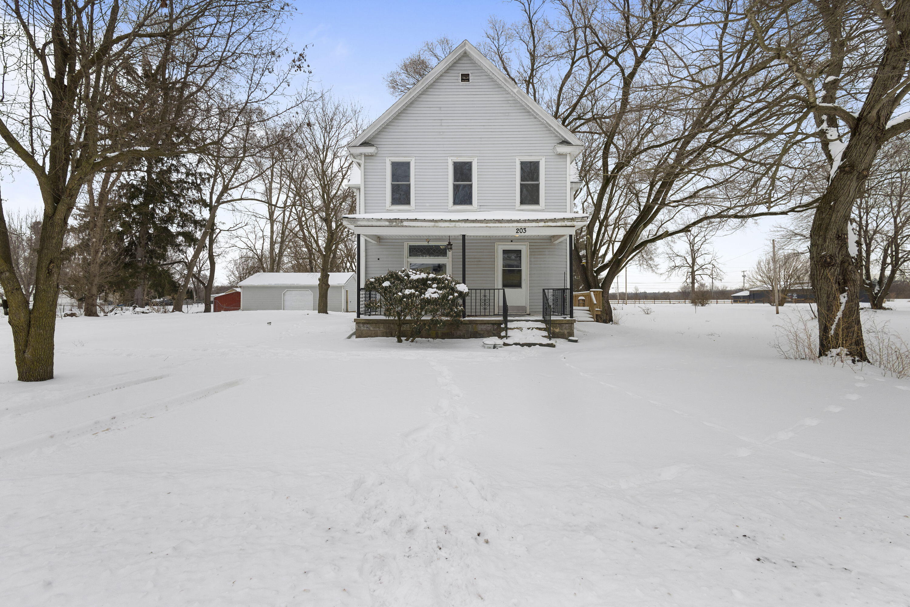 203 North Main Street Kingsbury, IN 46350 - Photo 32 of 32 a view of house with snow in the background
