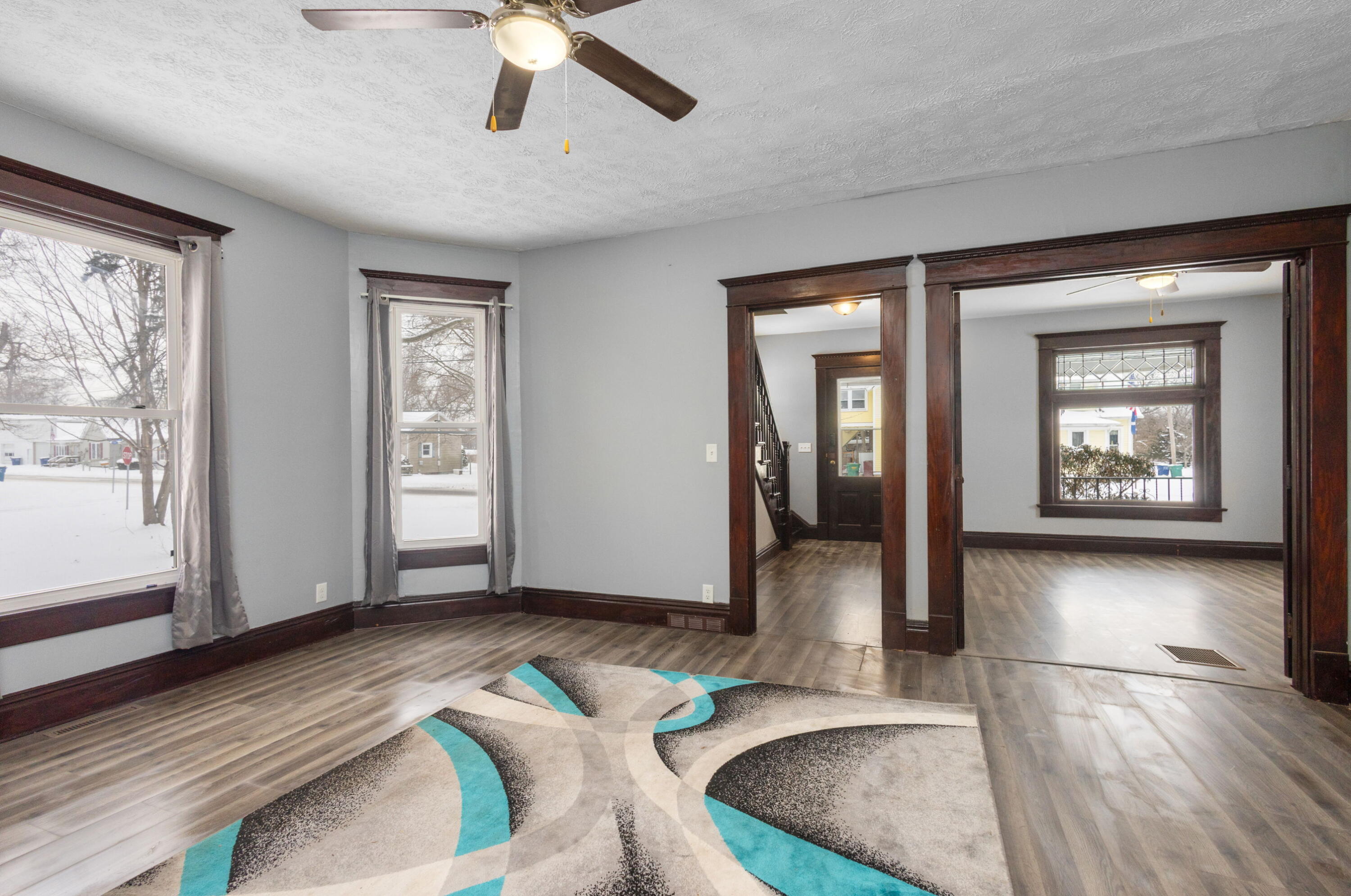 203 North Main Street Kingsbury, IN 46350 - Photo 4 of 32 a view of livingroom with hardwood floor and hallway