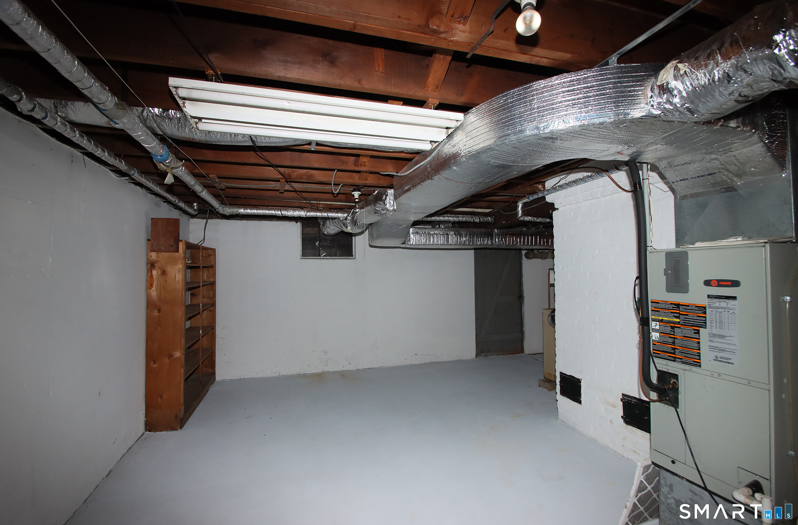23 Norway Road North Haven, CT 06473 - Photo 27 of 32 a view of an empty room with a fireplace