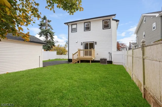 a view of a back yard of the house
