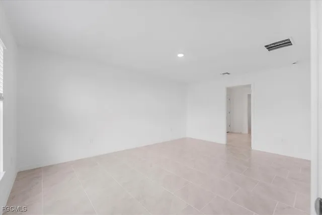 a bathroom with 2 sink and a mirror