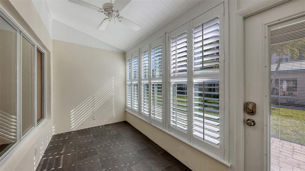 5860 Midnight Pass Road, Unit 40 Sarasota, FL 34242 - Photo 19 of 37 a view of a room that has a large window