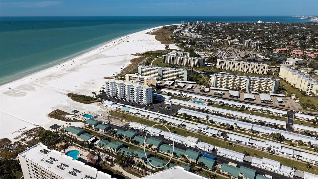 5860 Midnight Pass Road, Unit 40 Sarasota, FL 34242 - Photo 32 of 37 a view of balcony with wooden floor