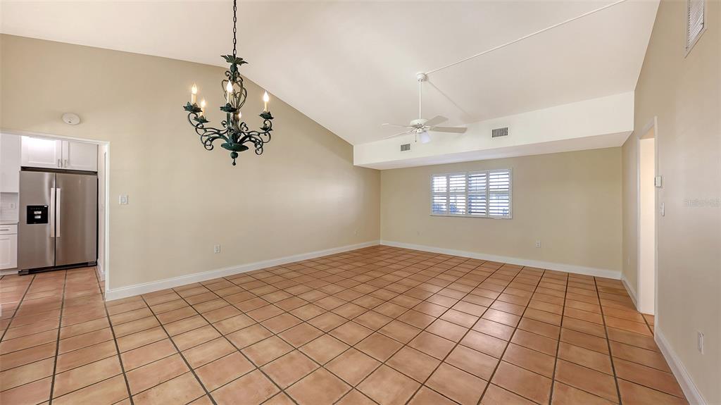 5860 Midnight Pass Road, Unit 40 Sarasota, FL 34242 - Photo 8 of 37 a view of an empty room and window