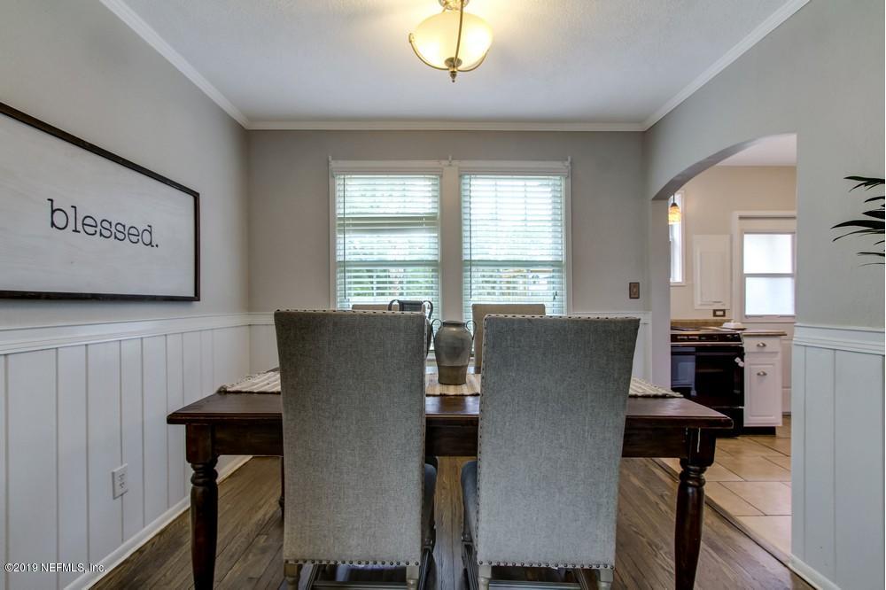 3752 Lilly Road North Jacksonville, FL 32207 - Photo 12 of 28 a view of a dining room with furniture and window