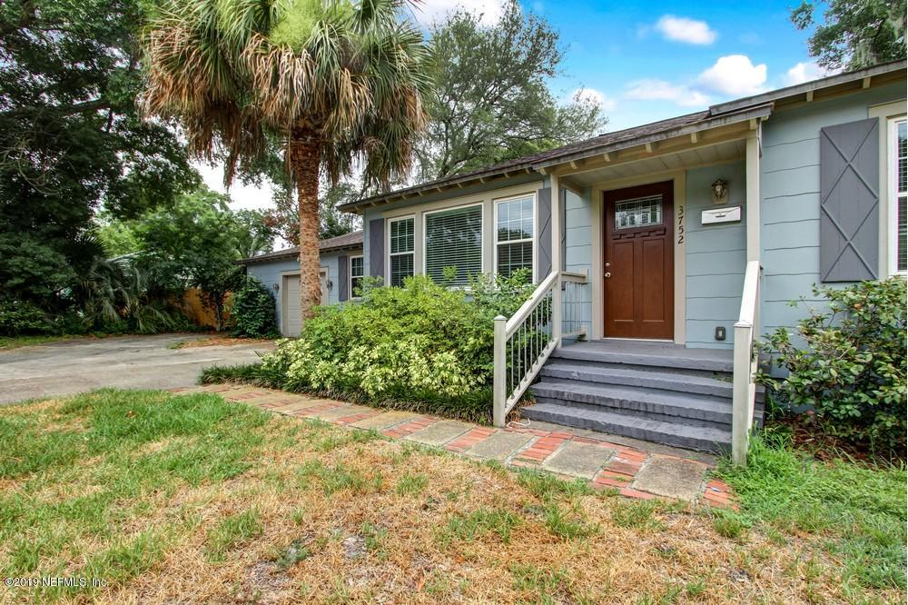 3752 Lilly Road North Jacksonville, FL 32207 - Photo 3 of 28 a front view of a house with a yard