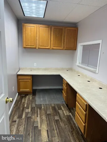 a utility room with cabinets