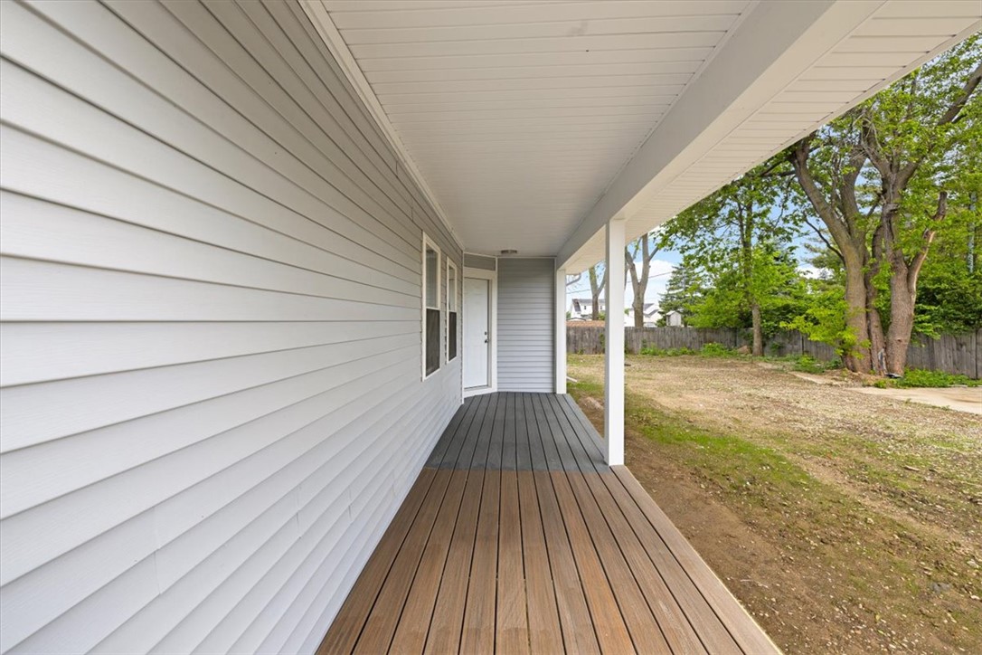 629 Little Meadow Drive Riverside, OH 45404 - Photo 44 of 48 This inviting covered porch provides a seamless connection to the outdoor landscape.