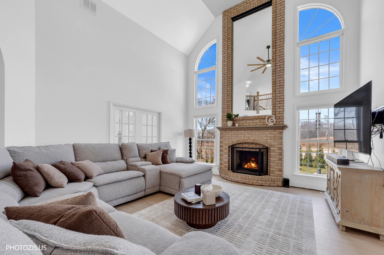 3517 Oakleaf Lane Crystal Lake, IL 60012 - Photo 12 of 76 a living room with furniture and a fireplace