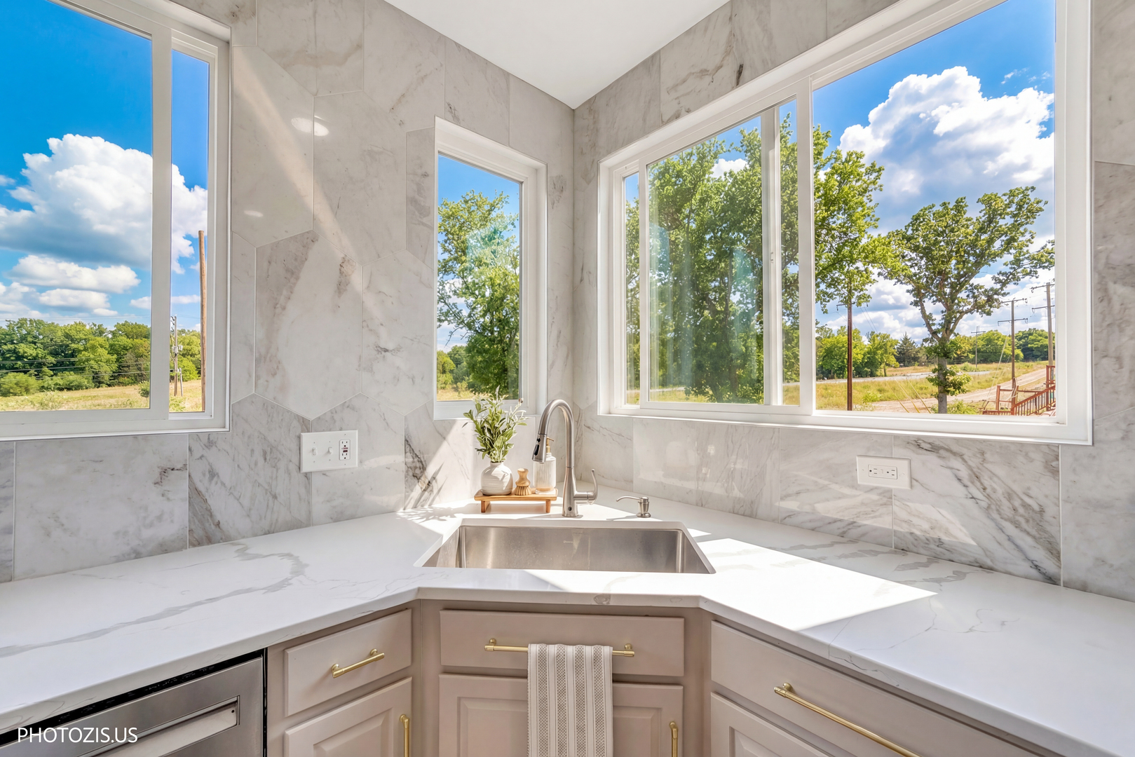 3517 Oakleaf Lane Crystal Lake, IL 60012 - Photo 15 of 76 a kitchen with a sink and large window