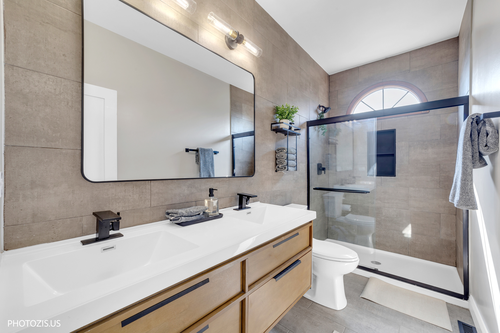 3517 Oakleaf Lane Crystal Lake, IL 60012 - Photo 27 of 76 a bathroom with a sink a toilet and shower