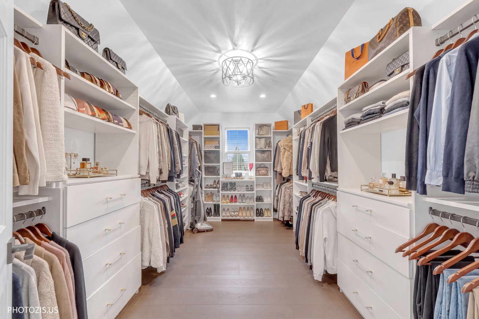 3517 Oakleaf Lane Crystal Lake, IL 60012 - Photo 35 of 76 a view of walk in closet with clothes and shoes