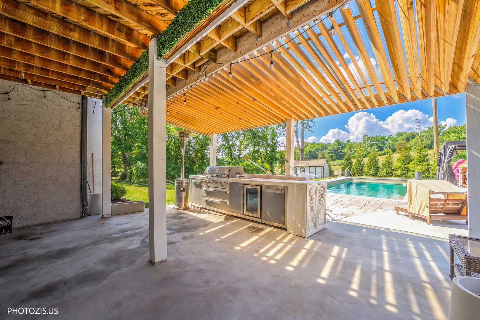 3517 Oakleaf Lane Crystal Lake, IL 60012 - Photo 54 of 76 a patio with a table and chairs and potted plants