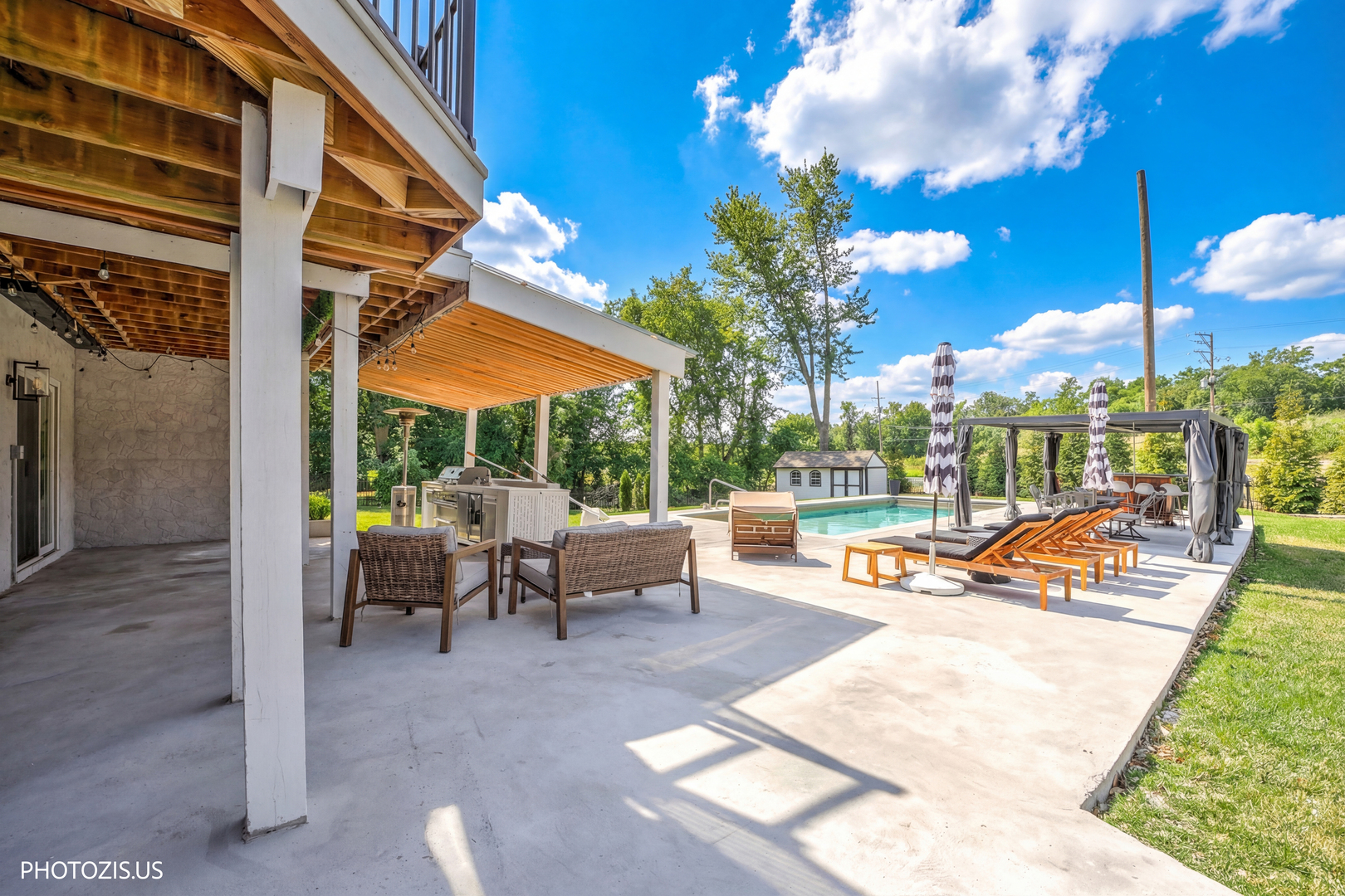 3517 Oakleaf Lane Crystal Lake, IL 60012 - Photo 55 of 76 a view of a patio with swimming pool table and chairs