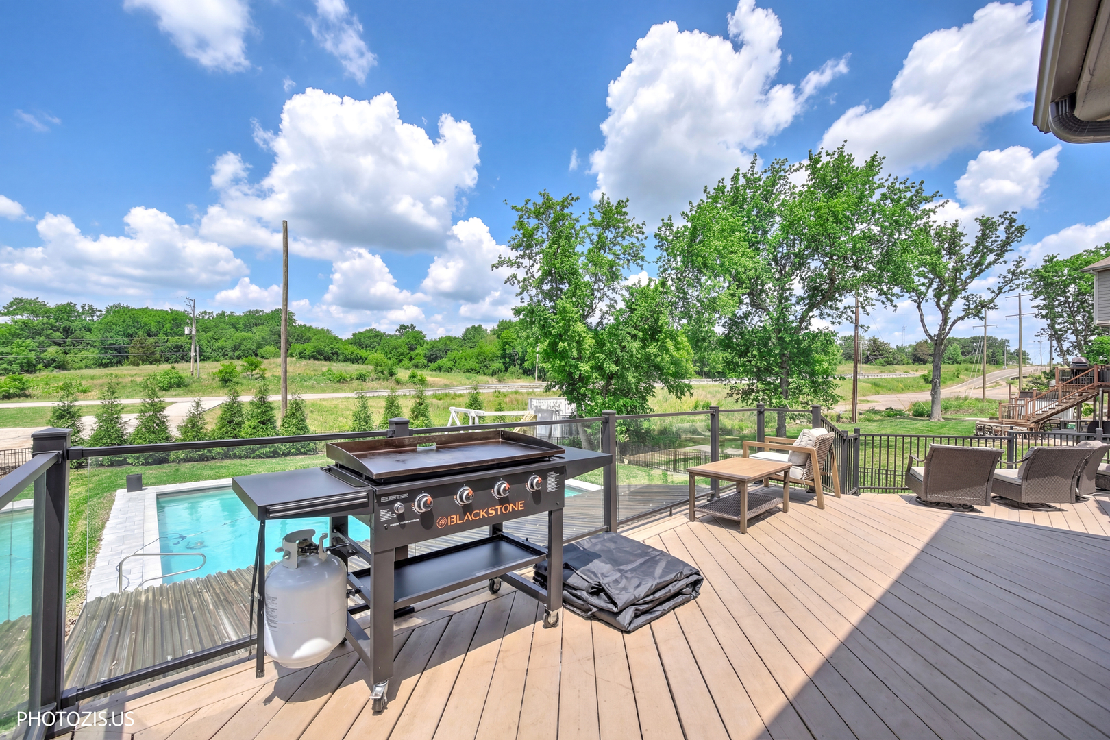 3517 Oakleaf Lane Crystal Lake, IL 60012 - Photo 68 of 76 a view of a patio with table and chairs potted plants with wooden floor