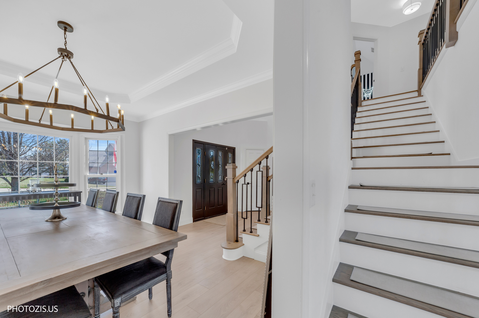 3517 Oakleaf Lane Crystal Lake, IL 60012 - Photo 7 of 76 a view of a dining room with furniture and wooden floor