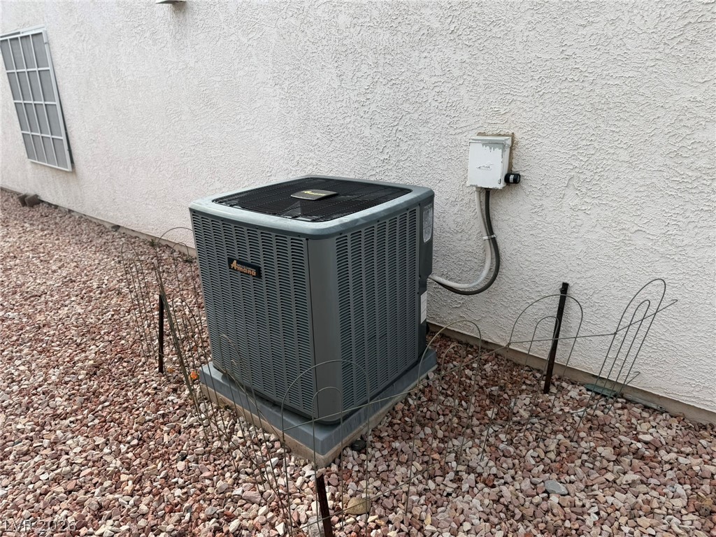 277 Gentle Bay Avenue Henderson, NV 89074 - Photo 2 of 43 Essential cooling unit provides comfort for warm days.