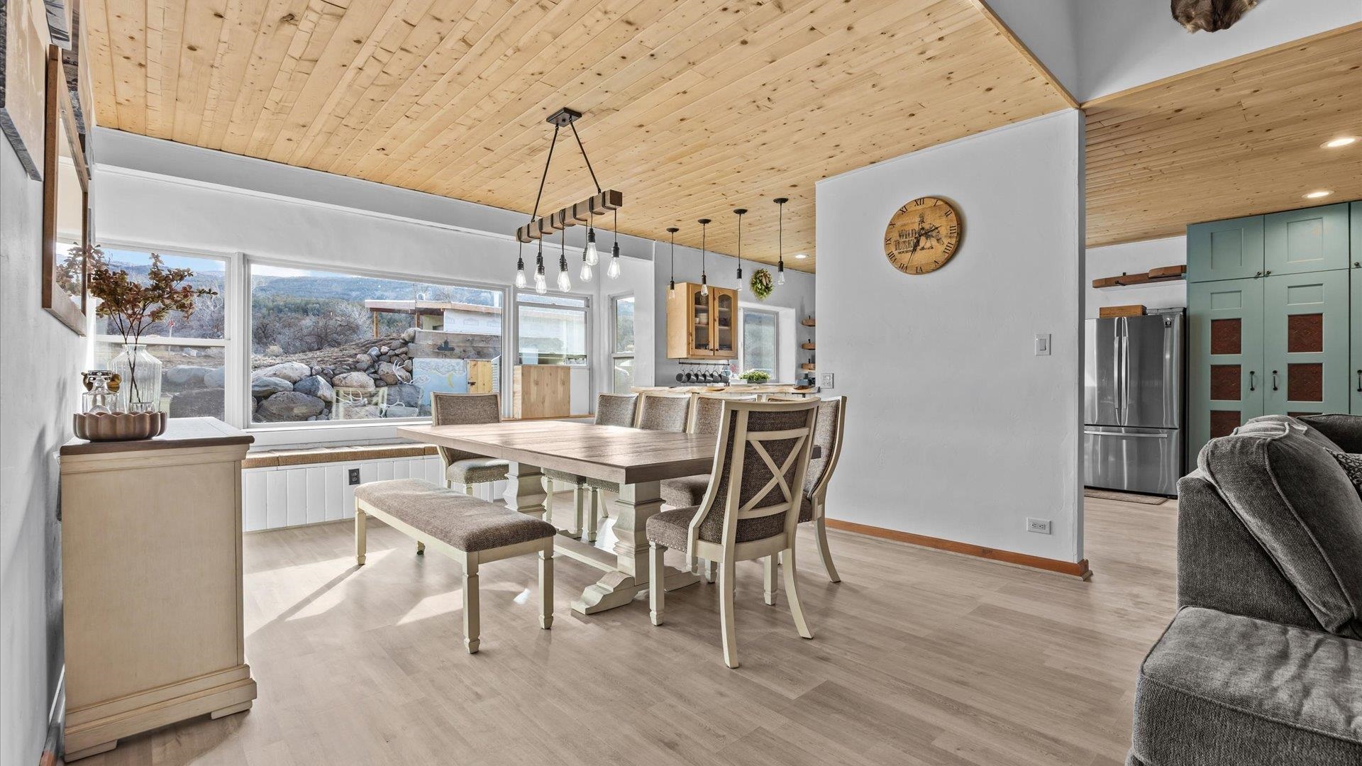 10795 52 52 1/2 Road Molina, CO 81646 - Photo 18 of 41 a view of a dining room with furniture and wooden floor