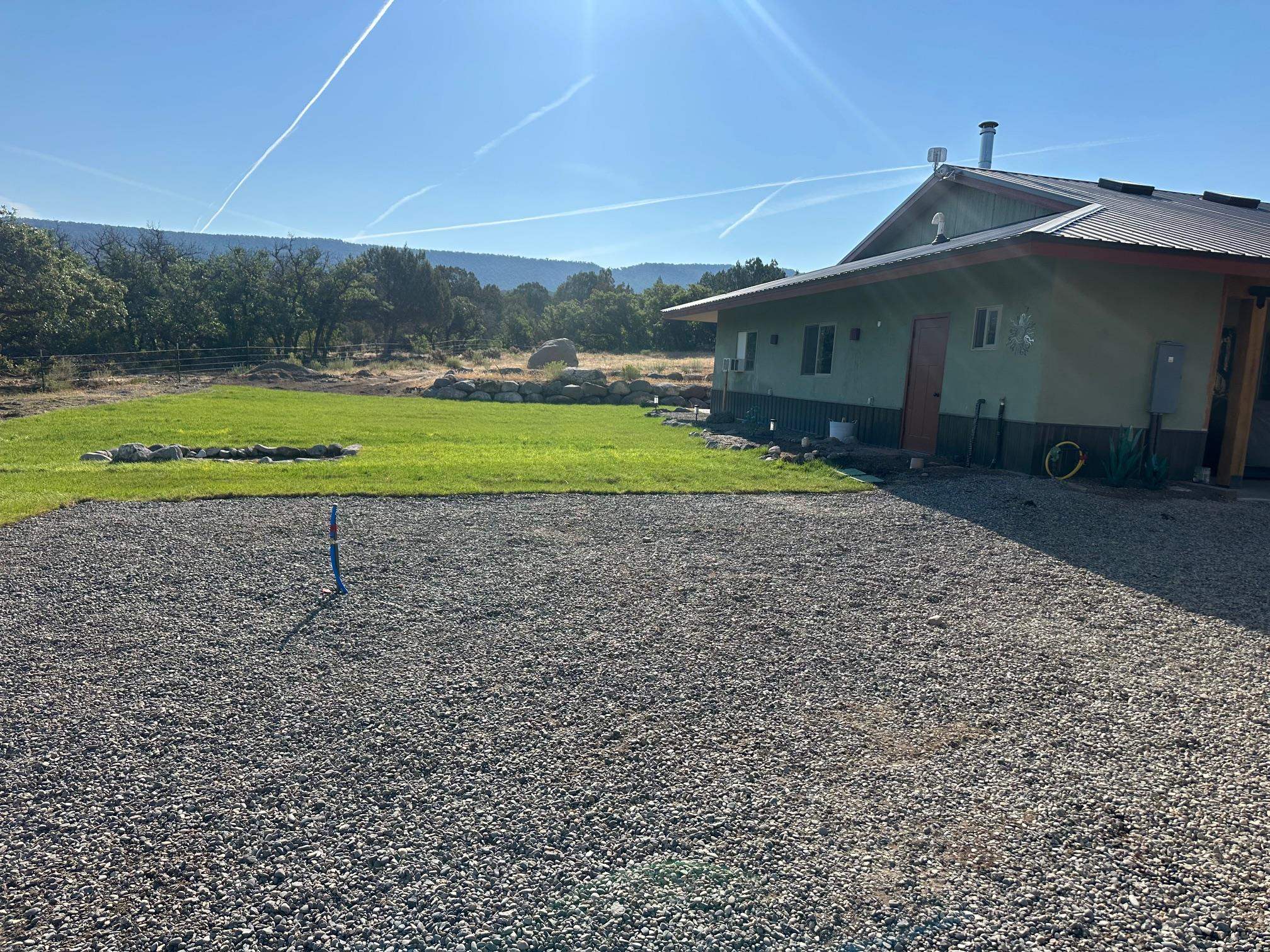 10795 52 52 1/2 Road Molina, CO 81646 - Photo 2 of 41 a view of a house with a yard
