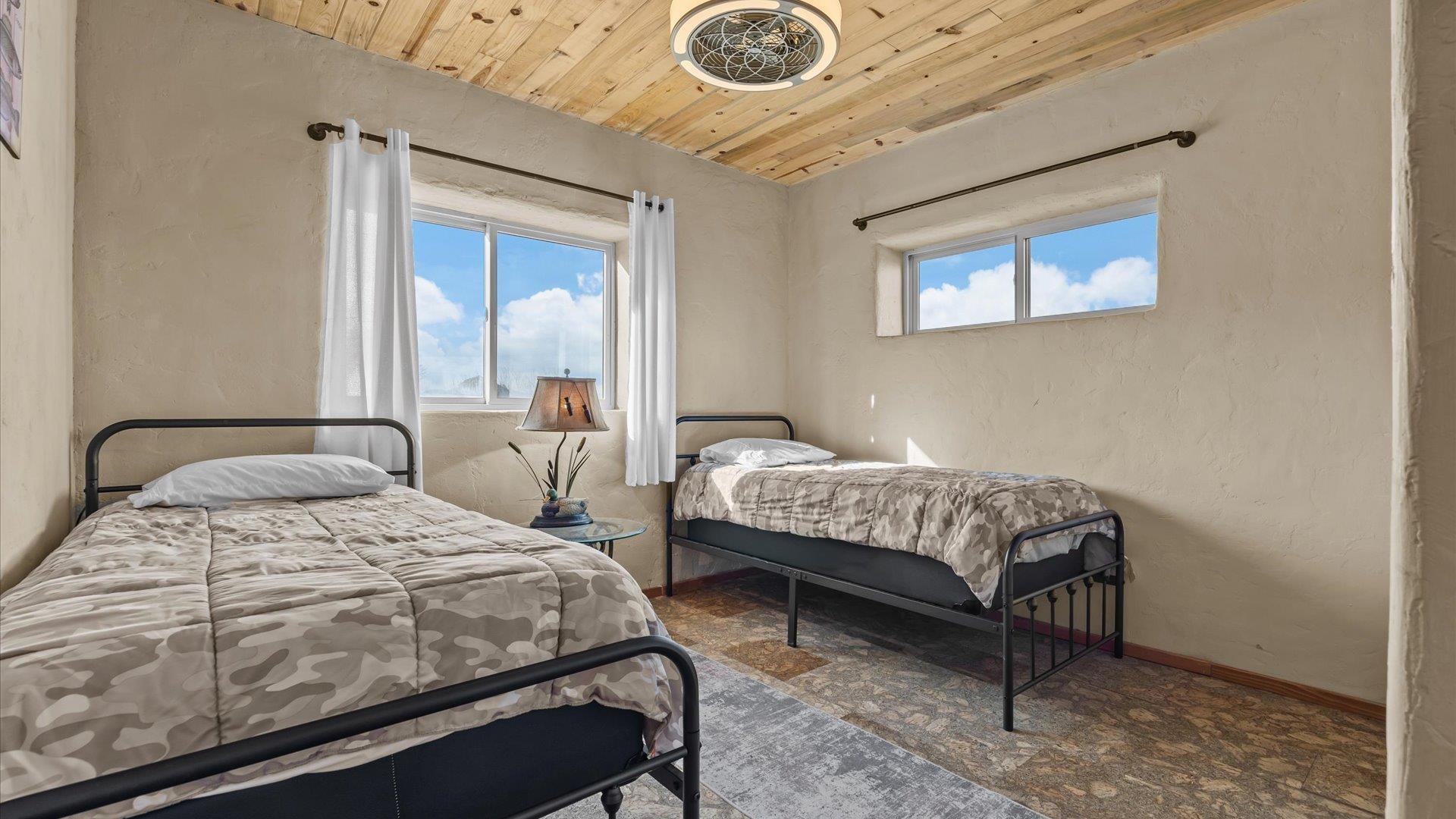 10795 52 52 1/2 Road Molina, CO 81646 - Photo 21 of 41 a bedroom with a bed and a window