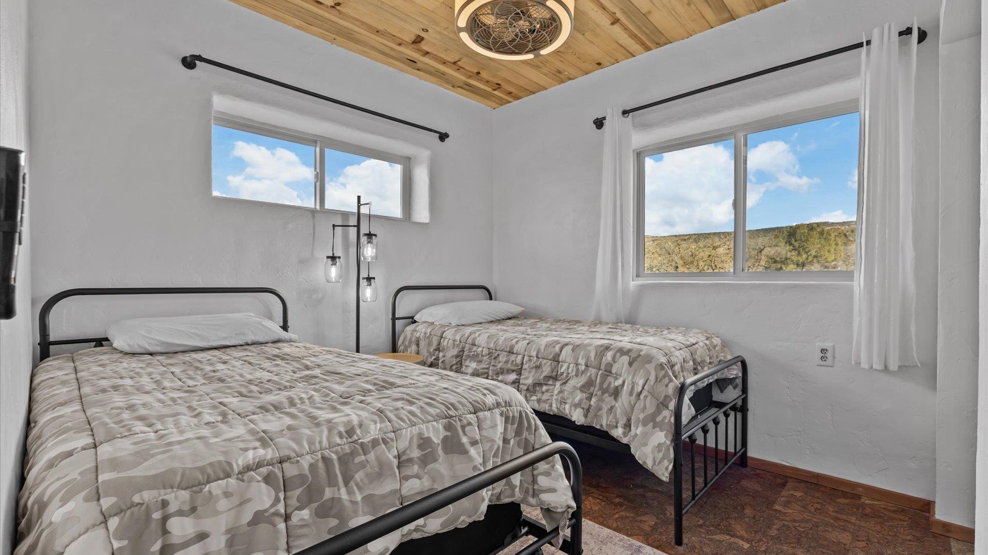 10795 52 52 1/2 Road Molina, CO 81646 - Photo 38 of 41 a bedroom with two beds and a window