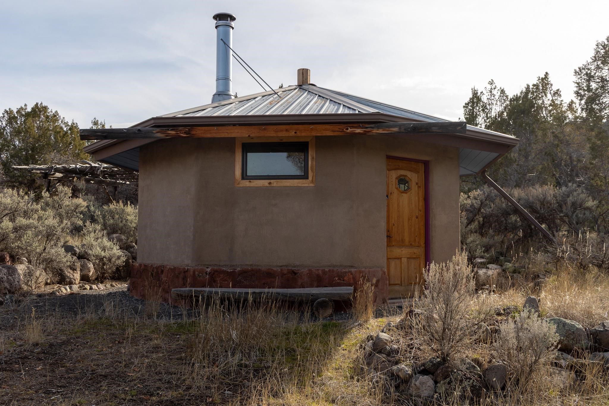10795 52 52 1/2 Road Molina, CO 81646 - Photo 7 of 41 a front view of a house with a yard