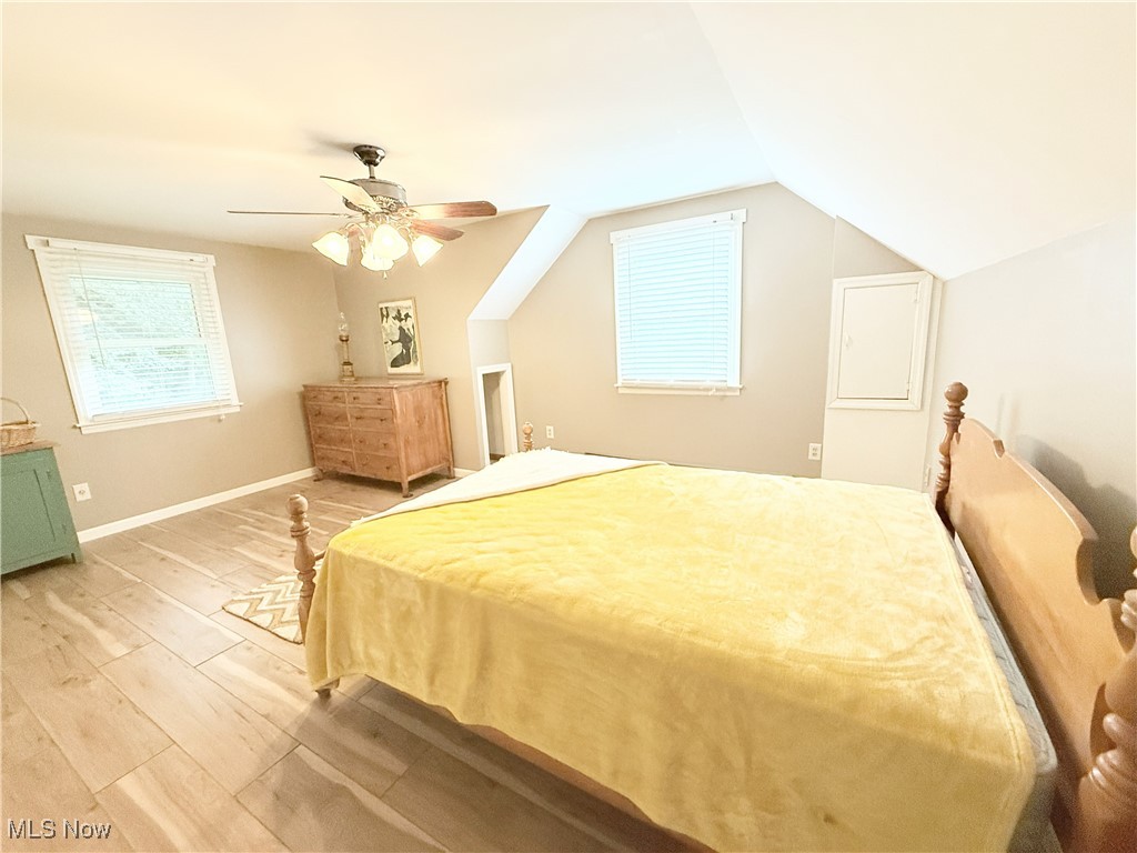 4901 Kings Creek Road Weirton, WV 26062 - Photo 19 of 28 Bedroom with light wood-style floors, a ceiling fan, and vaulted ceiling
