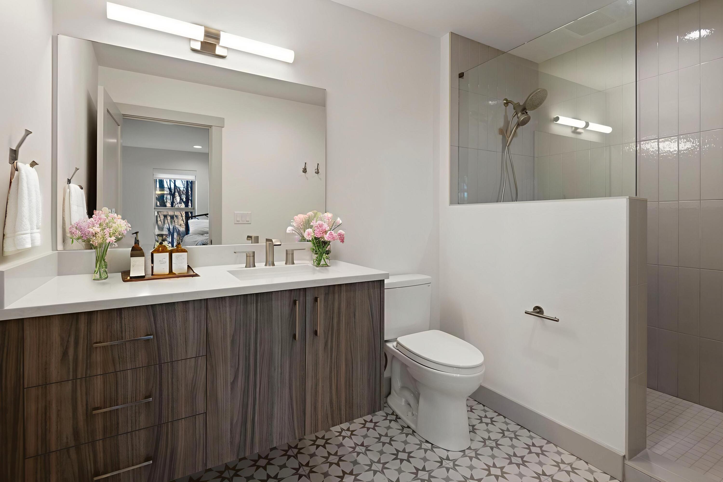 680 Southwest Otter Way Bend, OR 97702 - Photo 6 of 48 a bathroom with a sink a toilet and mirror