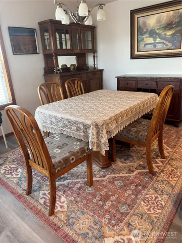 a view of a dining room with furniture