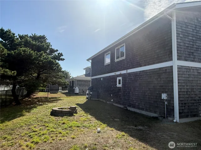 a view of swimming pool with sitting area