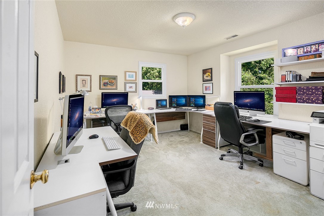 17905 Beall Road Southwest Vashon, WA 98070 - Photo 12 of 20 a view of a workspace with furniture and a window