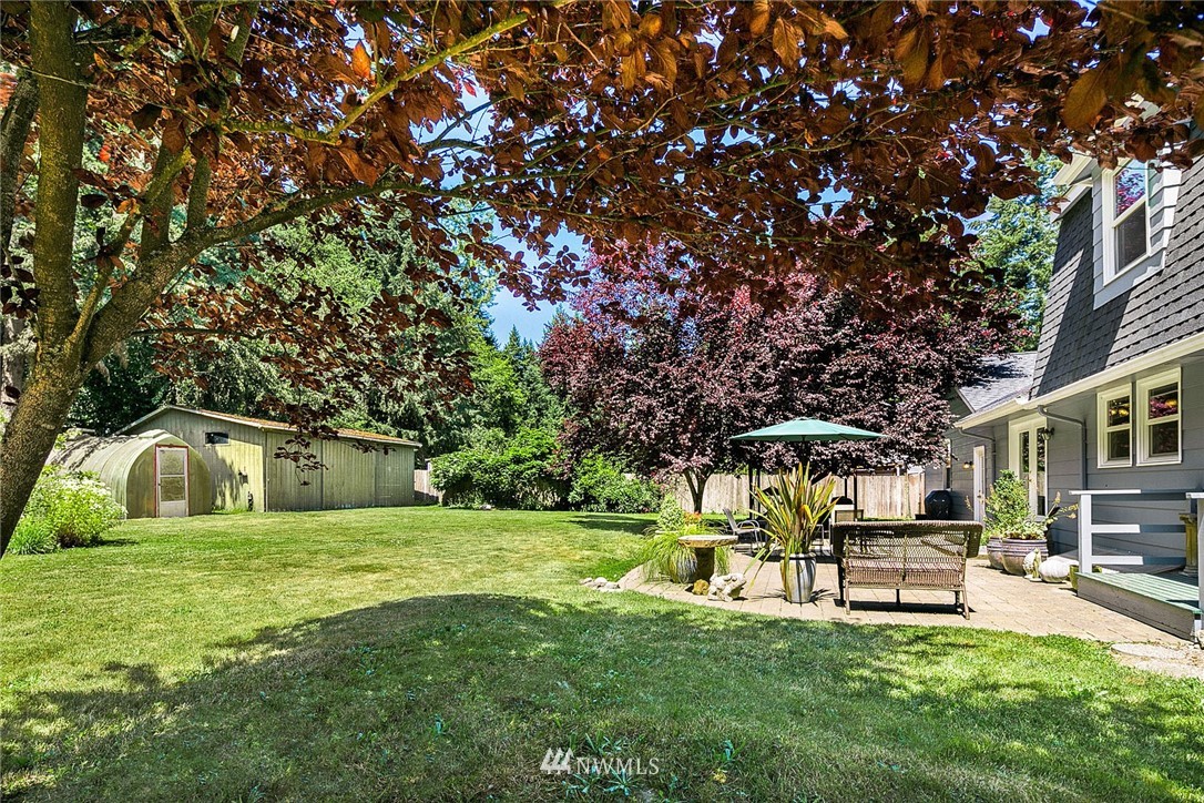 17905 Beall Road Southwest Vashon, WA 98070 - Photo 18 of 20 a house view with a sitting space and garden