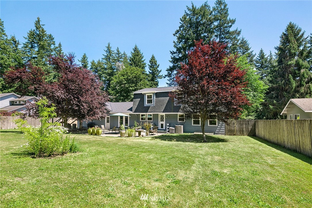 17905 Beall Road Southwest Vashon, WA 98070 - Photo 19 of 20 a front view of house with yard and green space