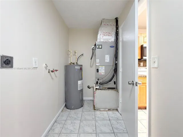 a view of hallway with windows