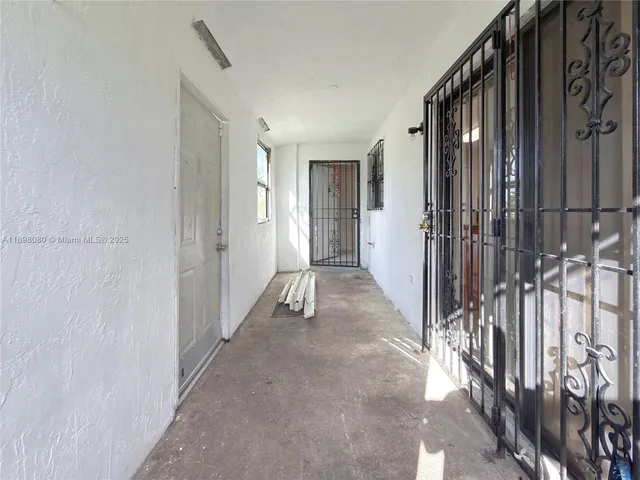 a view of a backyard of the house