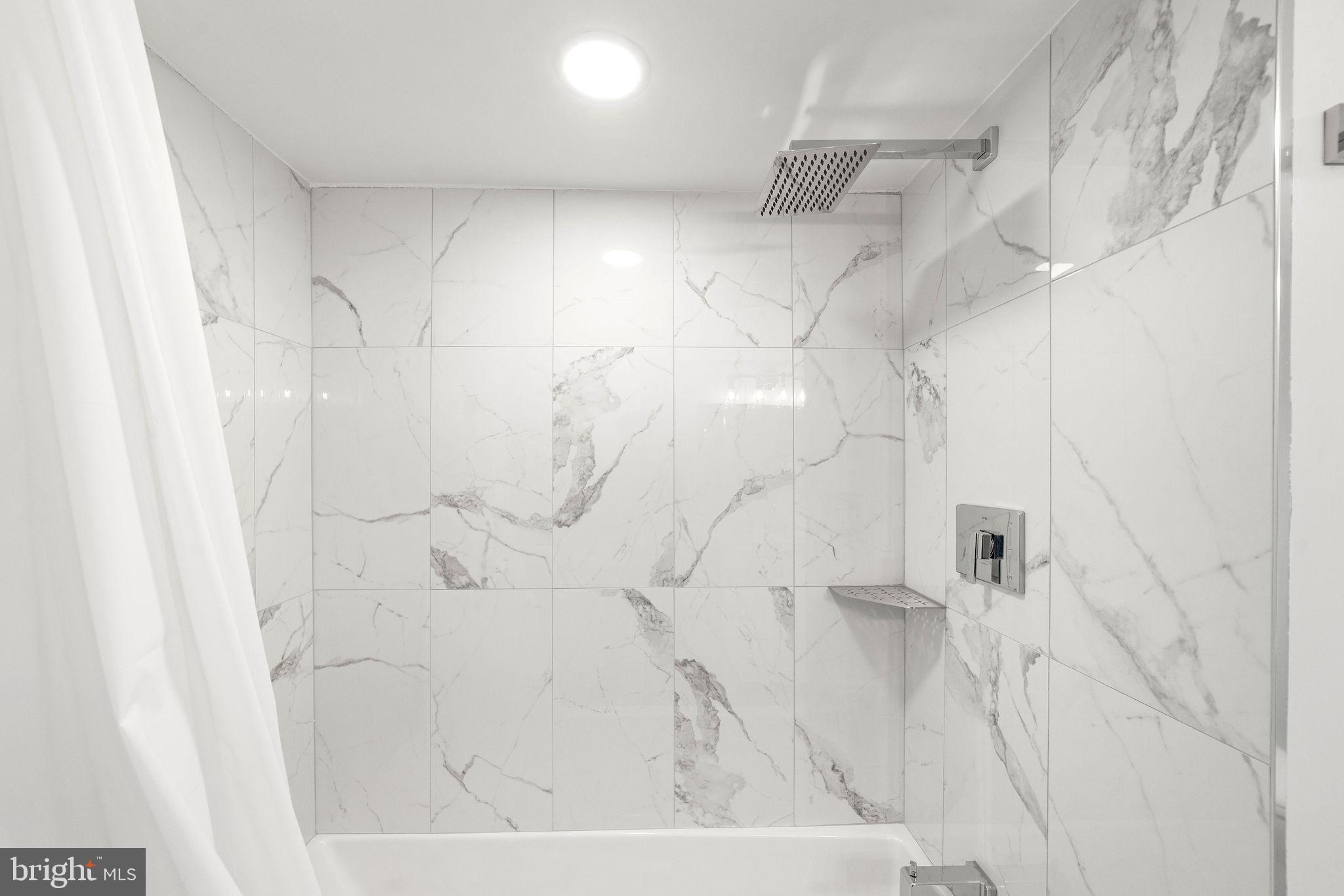 4 Walnut Street Salem, NJ 08079 - Photo 12 of 33 a bathroom with a shower