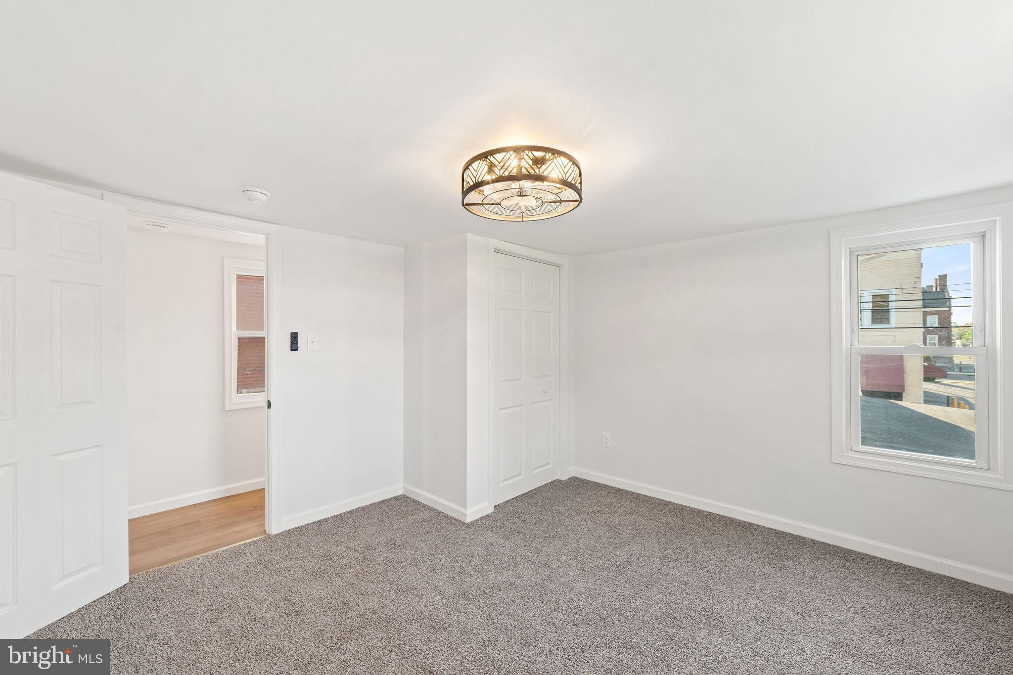 4 Walnut Street Salem, NJ 08079 - Photo 20 of 33 an empty room with a window