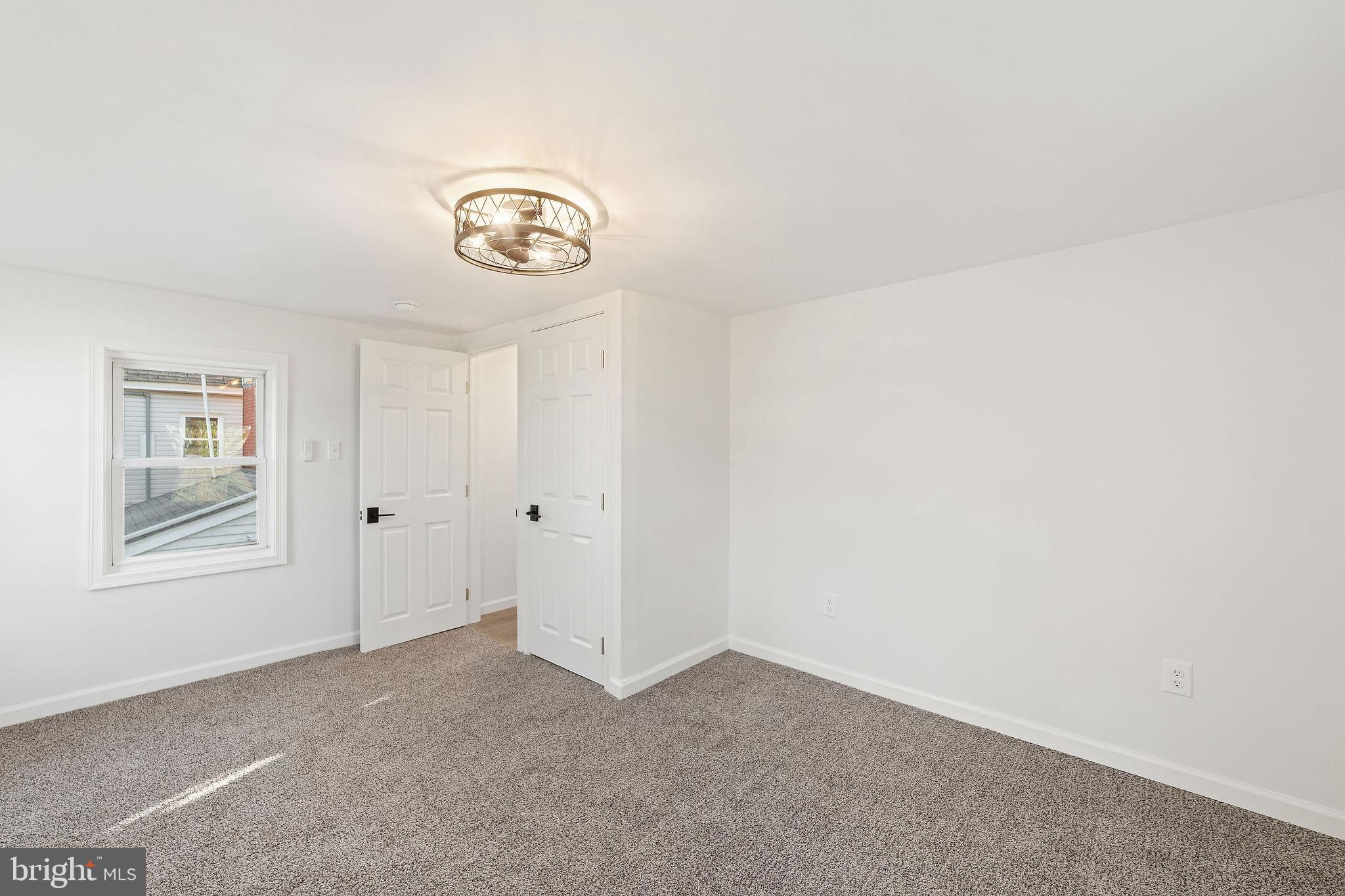 4 Walnut Street Salem, NJ 08079 - Photo 24 of 33 a view of an empty room with closet and a window