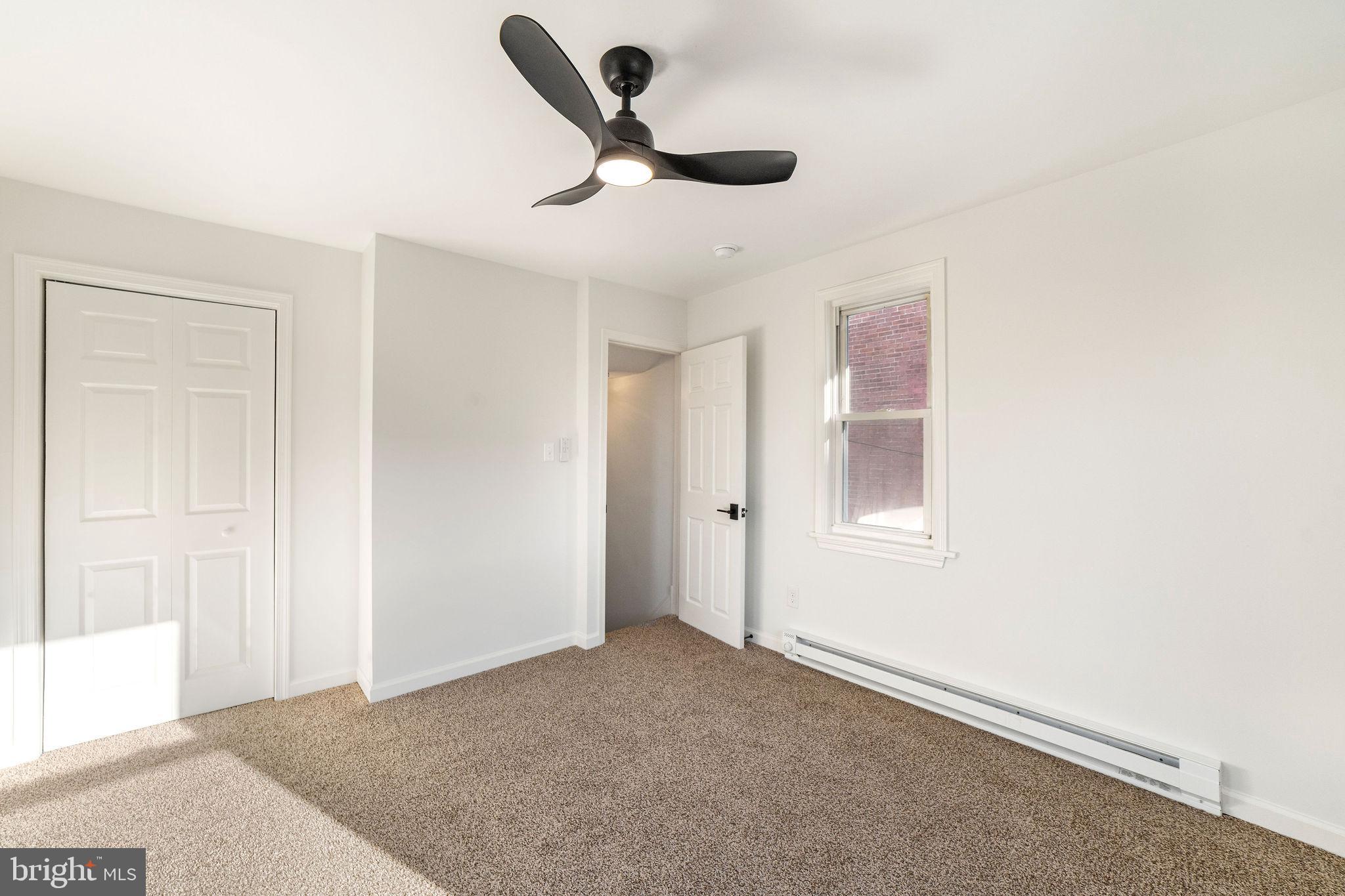 4 Walnut Street Salem, NJ 08079 - Photo 26 of 33 a view of a livingroom with a ceiling fan and window